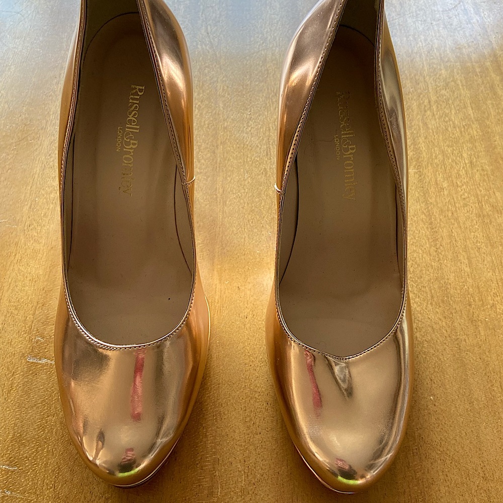 New Russell & Bromley gold patent stiletto shoes.